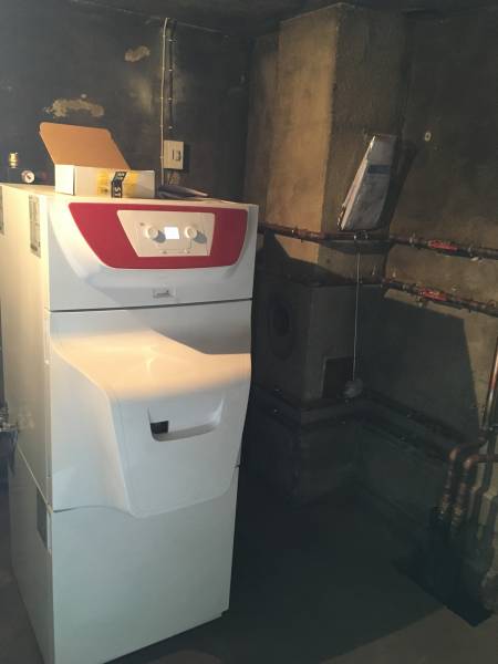 Remplacement chaudiére bois , par une chaudiére fioul a condensation en Charente - Maritime .